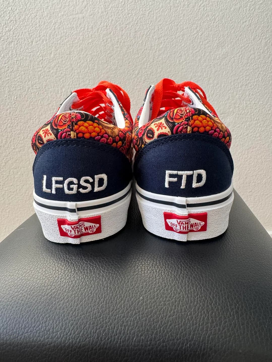 Heel view of the custom Padres Vans with LFGSD and FTD embroidery