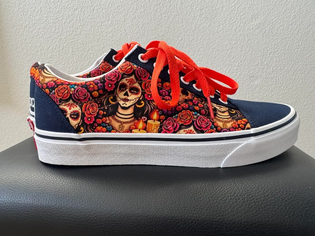 Custom Padres City Connect Vans Old Skool — angled pair shot with marigold-red laces
